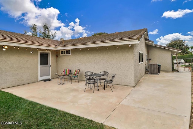 view of patio with central AC unit