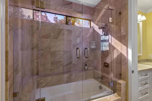 bathroom with crown molding and shower / bath combination with glass door