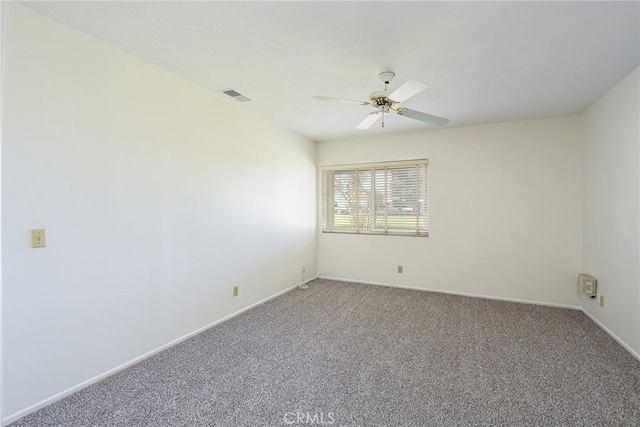 unfurnished room featuring carpet floors and ceiling fan