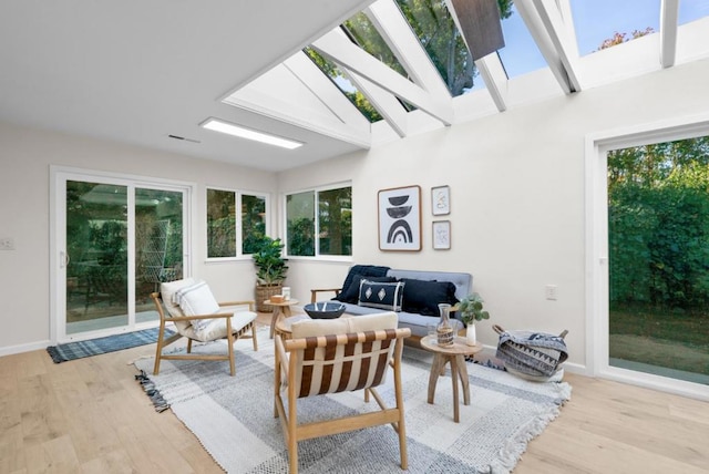 sunroom featuring a skylight