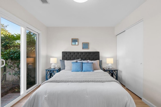 bedroom with a closet and light wood-type flooring