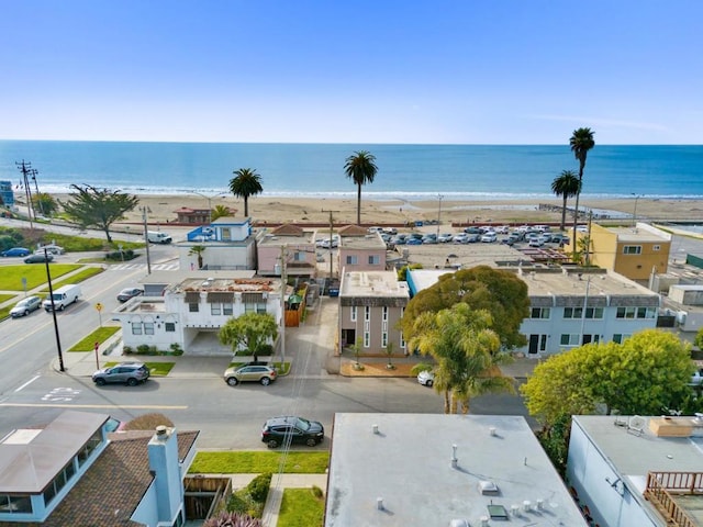 bird's eye view with a beach view and a water view