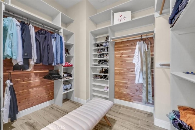 spacious closet featuring light wood-type flooring