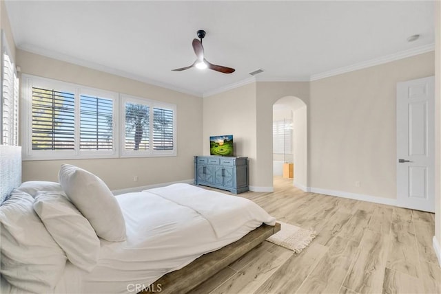 bedroom featuring light hardwood / wood-style flooring, ornamental molding, and ceiling fan