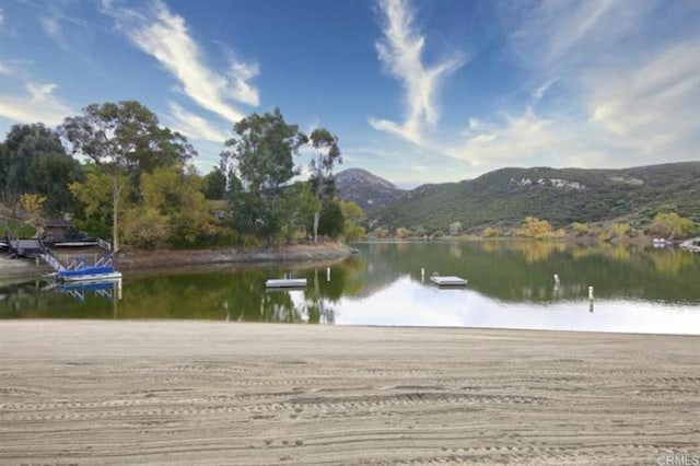 property view of water featuring a mountain view