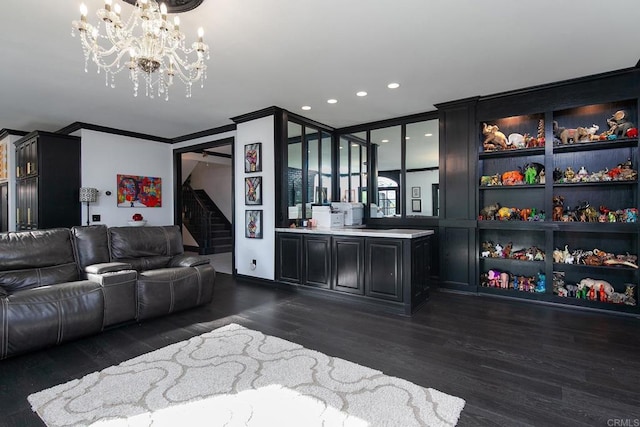 living room with ornamental molding and dark hardwood / wood-style flooring