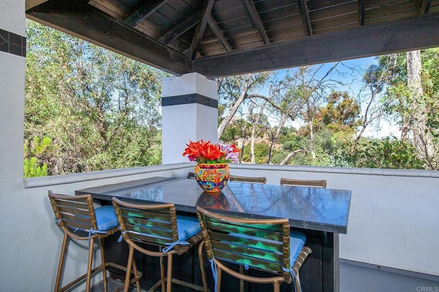 view of patio featuring exterior bar