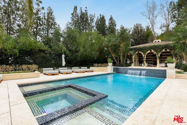 view of pool with an in ground hot tub, a patio, and a gazebo