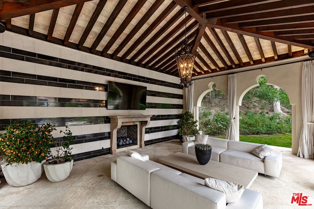 view of patio / terrace featuring an outdoor living space with a fireplace