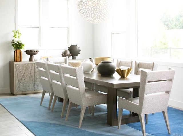 dining room with wood-type flooring