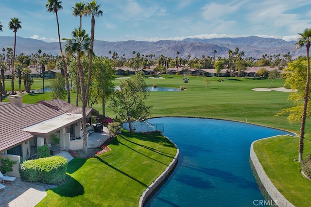 57 Ponderosa Cir, Palm Desert, CA 92211 - surrounding community with a water and mountain view, a residential view, view of golf course, and a lawn