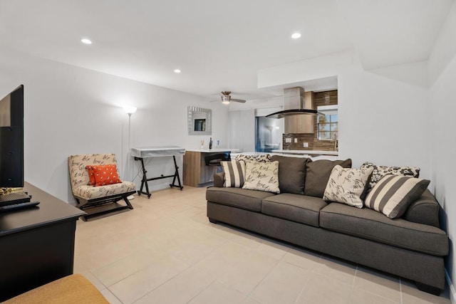 living room with light tile patterned flooring and ceiling fan