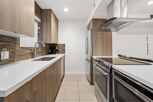 kitchen featuring sink, light tile patterned floors, backsplash, stainless steel appliances, and island exhaust hood