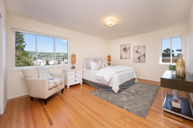 bedroom featuring light wood-type flooring