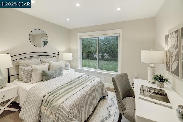 bedroom featuring light hardwood / wood-style floors