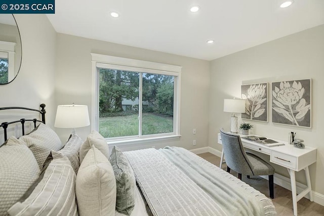 bedroom featuring wood-type flooring