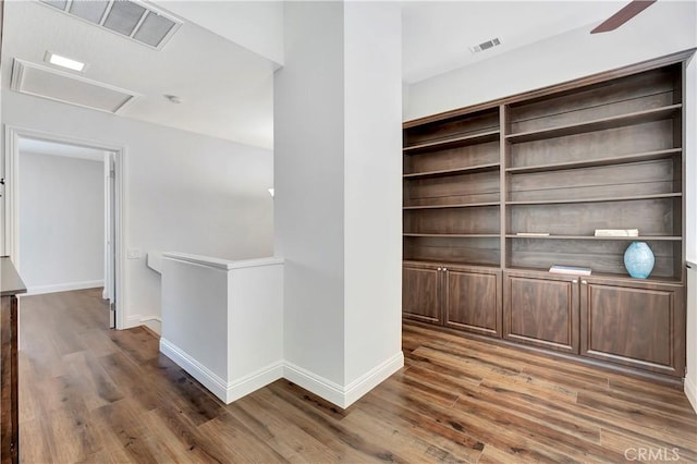 hall featuring dark wood-type flooring