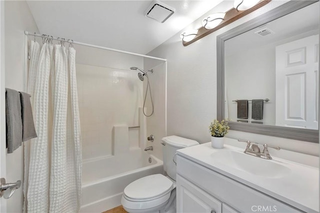 full bathroom featuring vanity, toilet, and shower / bath combo with shower curtain