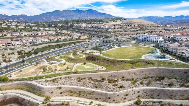 drone / aerial view featuring a mountain view