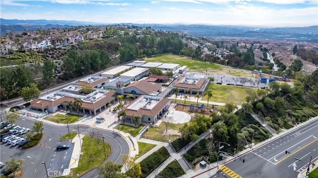 birds eye view of property featuring a mountain view