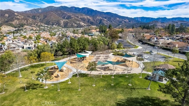 drone / aerial view featuring a mountain view