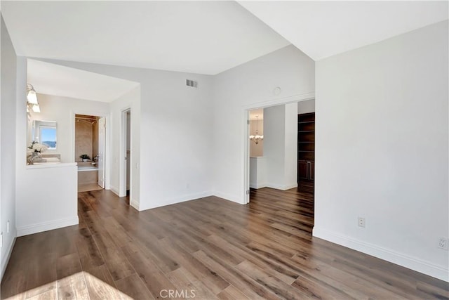 spare room featuring hardwood / wood-style flooring