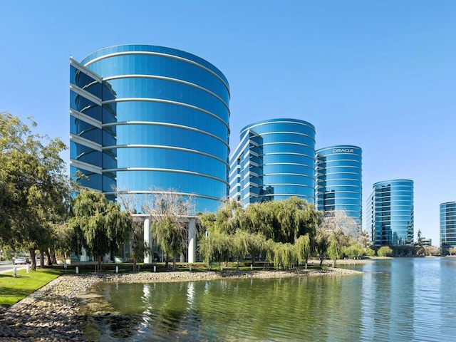 view of building exterior with a water view