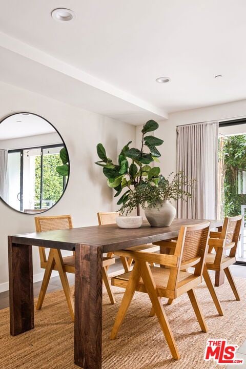 dining room featuring a healthy amount of sunlight