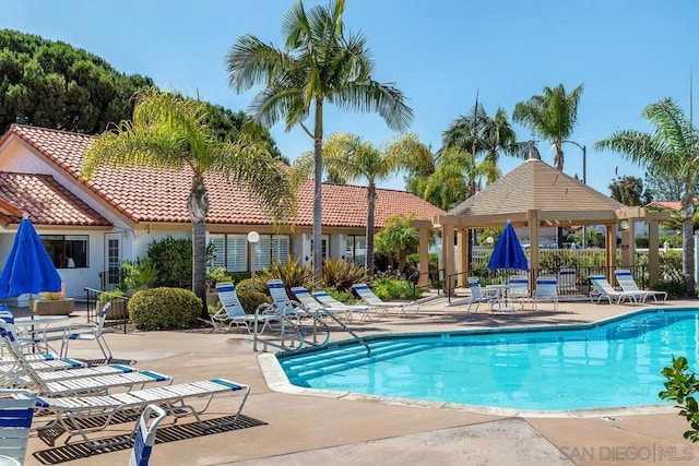 view of pool with a gazebo and a patio area