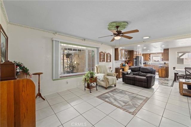 living room with light tile patterned floors and ceiling fan