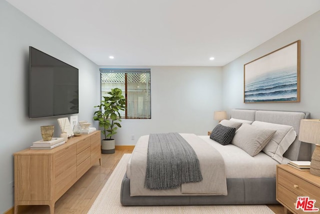 bedroom featuring light wood-type flooring