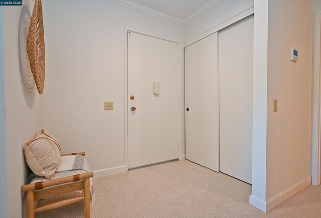 living area featuring ornamental molding and light colored carpet