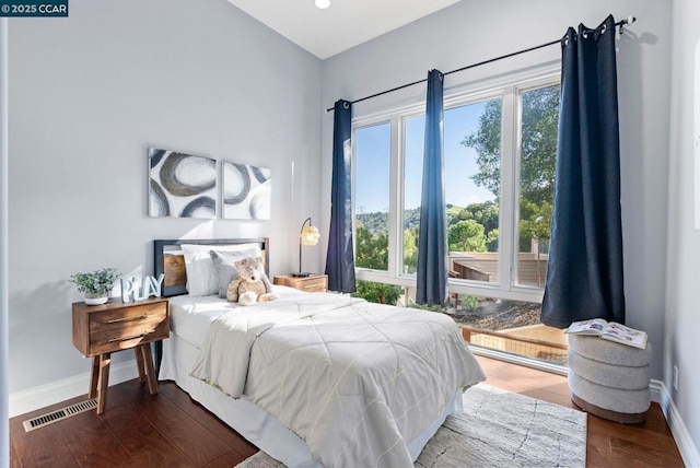 bedroom featuring hardwood / wood-style flooring