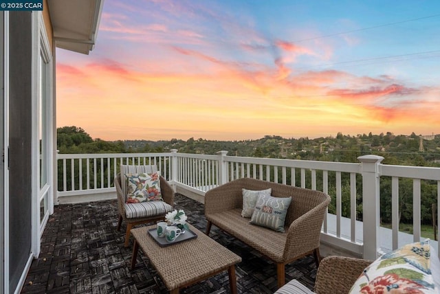 view of balcony at dusk