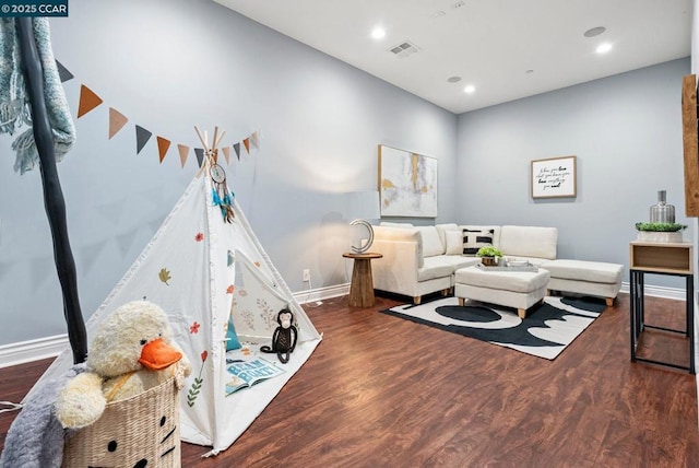 living room featuring dark hardwood / wood-style flooring