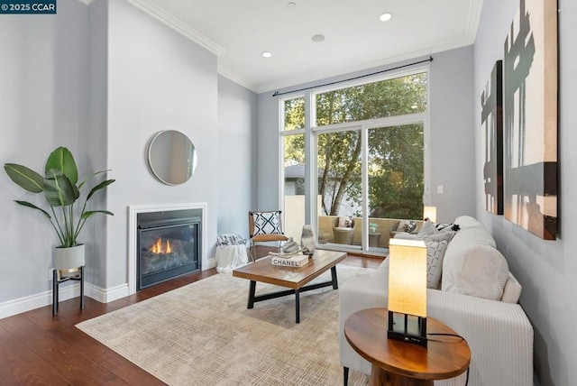 living room with ornamental molding and dark wood-type flooring