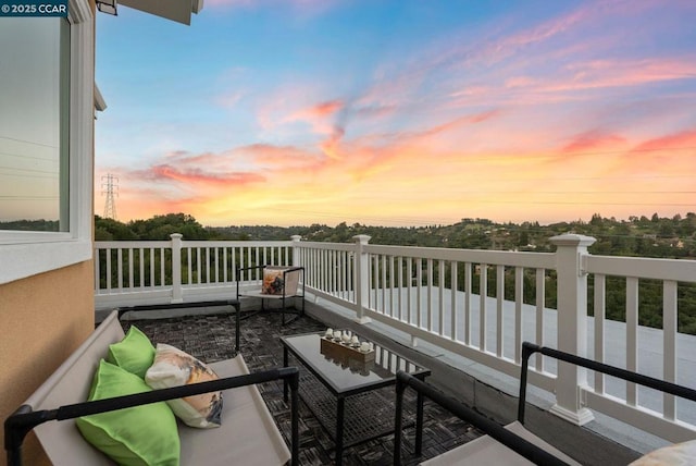 view of balcony at dusk