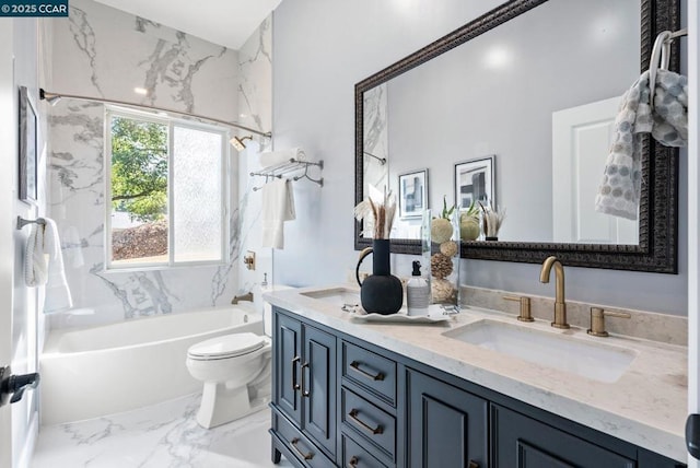 full bathroom with vanity, tiled shower / bath combo, and toilet