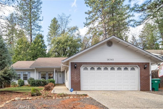 ranch-style house featuring a garage