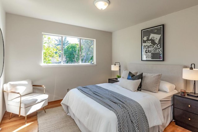 bedroom with light wood-type flooring