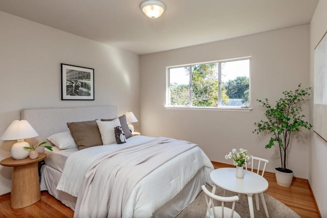 bedroom featuring wood-type flooring