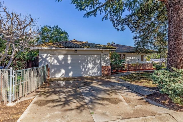 view of front of home with a garage