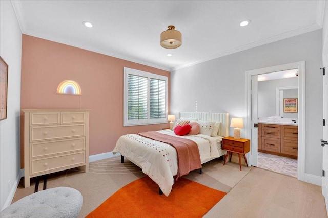 bedroom featuring ornamental molding and connected bathroom