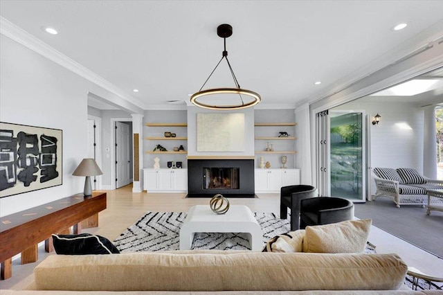 living room with ornamental molding and light wood-type flooring