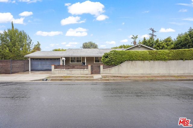 ranch-style home with a garage