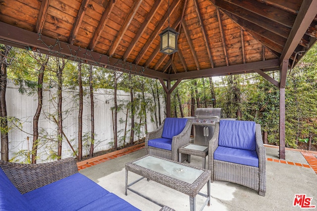 view of patio / terrace featuring a gazebo and area for grilling