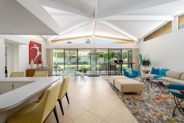 tiled living room with vaulted ceiling with beams and a wealth of natural light