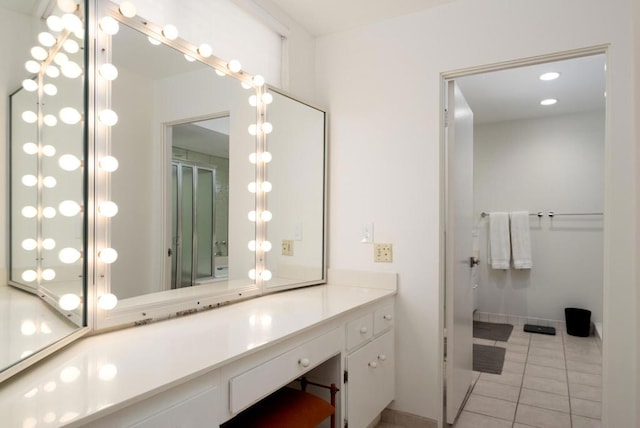 bathroom featuring tile patterned floors and vanity