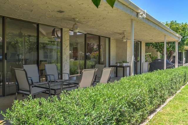 view of patio / terrace featuring ceiling fan and area for grilling