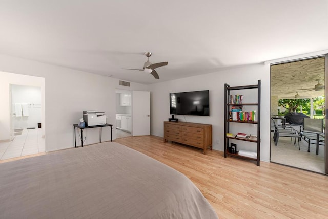 bedroom with ceiling fan and light hardwood / wood-style flooring